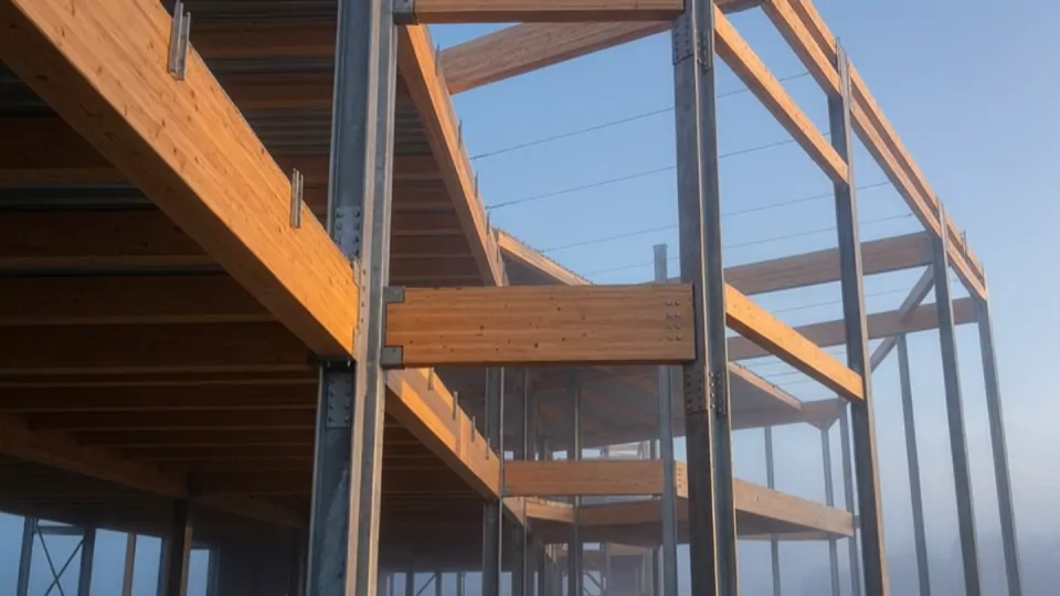 The deck edge against the softening city haze